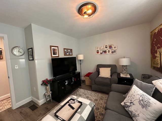 326 Dublin Rd, Jaffrey, NH 03452 - living room featuring dark wood-style flooring and baseboards