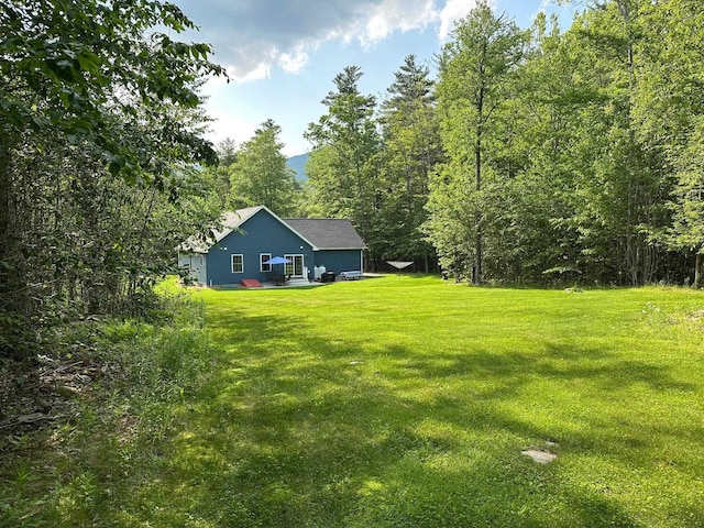 326 Dublin Rd, Jaffrey, NH 03452 - view of green lawn with a forest view