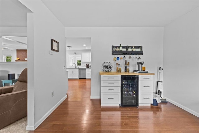 33 Winterlane Cir, Essex, VT 05452 - indoor dry bar featuring wine cooler, dishwasher, and dark wood finished floors