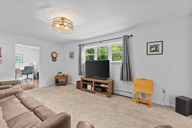 33 Winterlane Cir, Essex, VT 05452 - carpeted living room with baseboard heating and a desk