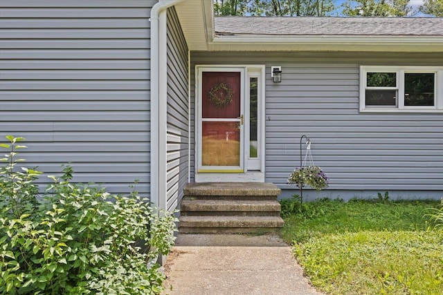 33 Winterlane Cir, Essex, VT 05452 - property entrance featuring a shingled roof