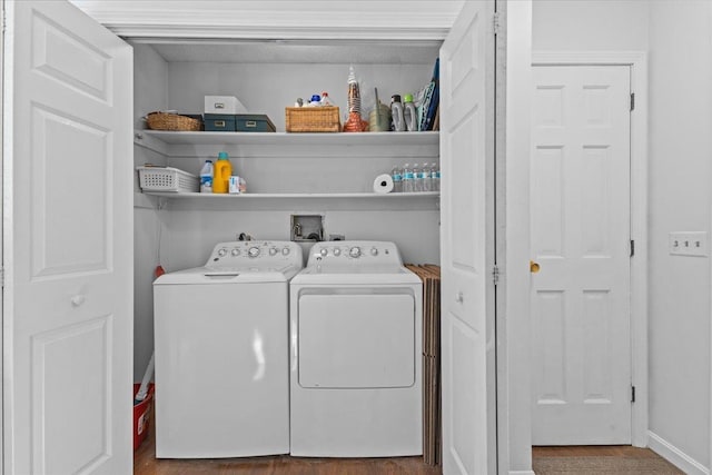 33 Winterlane Cir, Essex, VT 05452 - laundry area with washing machine and clothes dryer and wood finished floors