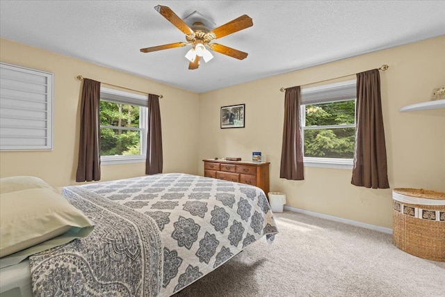 33 Winterlane Cir, Essex, VT 05452 - carpeted bedroom with baseboards and ceiling fan