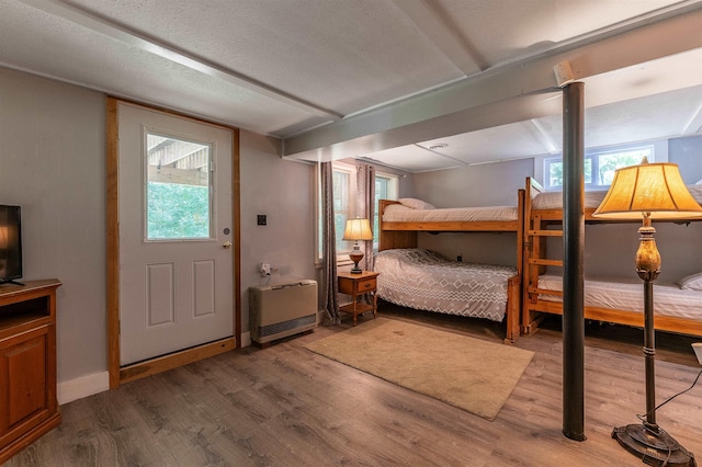 35 Alpstrausse Rd, Bartlett, NH 03845 - bedroom with wood finished floors and heating unit