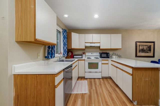 36 Circle Dr # 3, Ashland, NH 03217 - kitchen with white range with electric cooktop, black microwave, stainless steel dishwasher, light wood-style flooring, and a peninsula