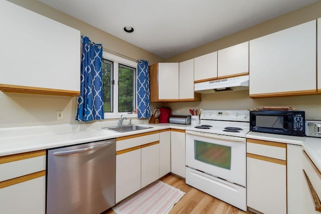 36 Circle Dr # 3, Ashland, NH 03217 - kitchen featuring dishwasher, electric stove, under cabinet range hood, black microwave, and light countertops
