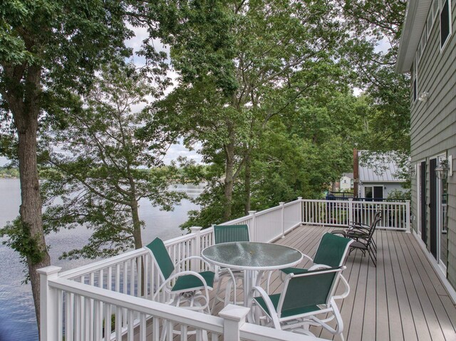 9 Blake Rd, Salem, NH 03079 - wooden deck featuring outdoor dining space and a water view