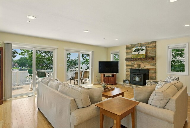 9 Blake Rd, Salem, NH 03079 - living room with light wood finished floors and recessed lighting