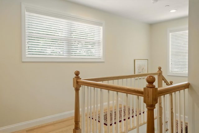 9 Blake Rd, Salem, NH 03079 - staircase featuring wood finished floors, plenty of natural light, and recessed lighting