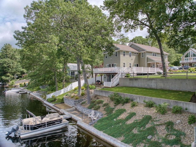9 Blake Rd, Salem, NH 03079 - rear view of property with stairs, a deck with water view, and boat lift