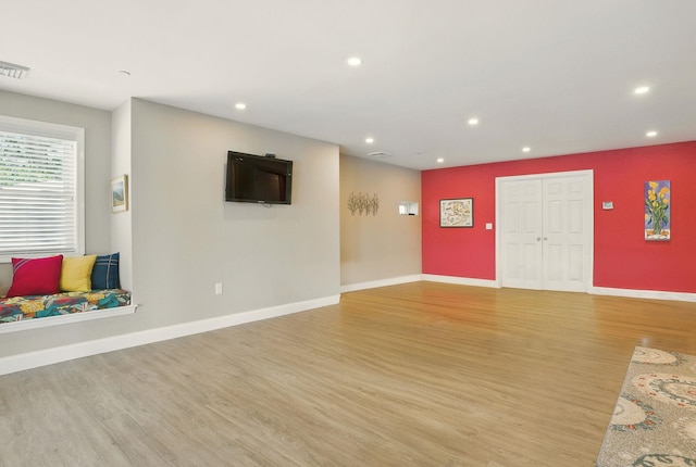 9 Blake Rd, Salem, NH 03079 - unfurnished living room featuring recessed lighting and light wood finished floors