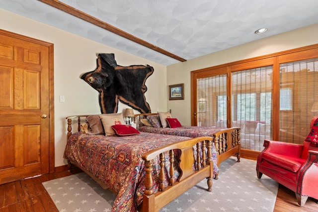 48 Merriman Forest Rd, Bartlett, NH 03812 - bedroom with wood finished floors and recessed lighting