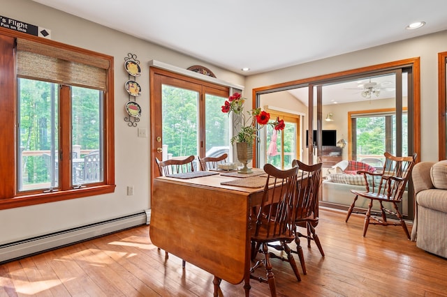 48 Merriman Forest Rd, Bartlett, NH 03812 - dining area with baseboard heating, light wood-type flooring, ceiling fan, and recessed lighting