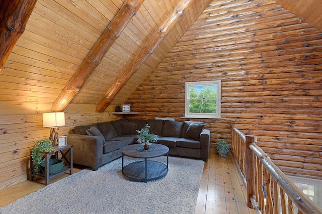 59 Ossipee Mountain Rd, Ossipee, NH 03814 - living room with wood ceiling, wood-type flooring, and rustic walls