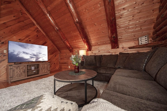 59 Ossipee Mountain Rd, Ossipee, NH 03814 - living area with wood finished floors, wood ceiling, and wood walls