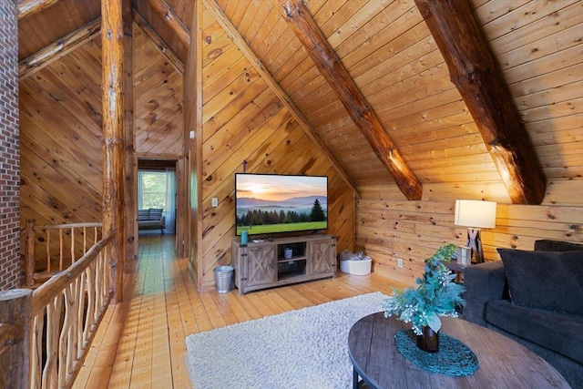 59 Ossipee Mountain Rd, Ossipee, NH 03814 - living room with light wood-style floors, wood ceiling, and wooden walls