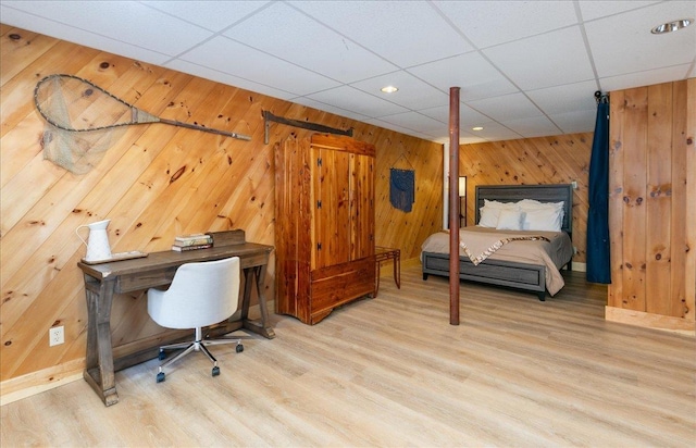 59 Ossipee Mountain Rd, Ossipee, NH 03814 - bedroom with wood walls, light wood-type flooring, a paneled ceiling, and recessed lighting