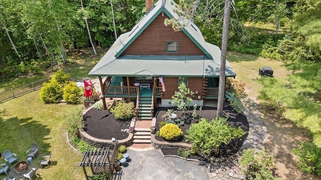 59 Ossipee Mountain Rd, Ossipee, NH 03814 - log home with log exterior, a porch, and stairway