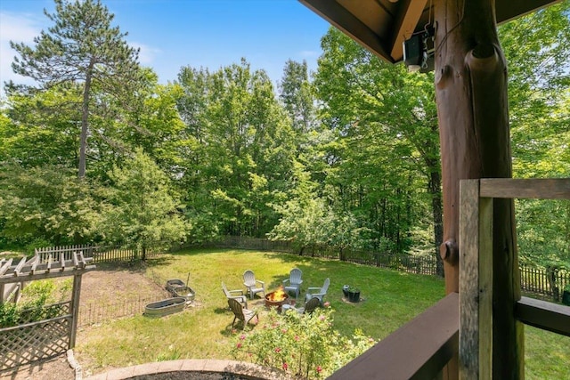 59 Ossipee Mountain Rd, Ossipee, NH 03814 - fenced backyard with an outdoor fire pit