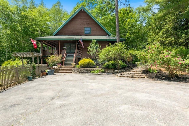 59 Ossipee Mountain Rd, Ossipee, NH 03814 - log home featuring a porch and log siding