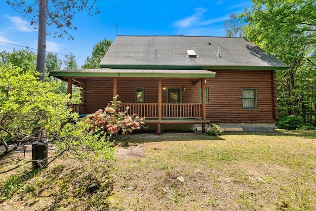 59 Ossipee Mountain Rd, Ossipee, NH 03814 - back of property featuring log exterior, a yard, and a porch