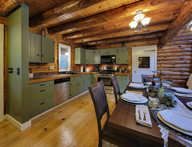 59 Ossipee Mountain Rd, Ossipee, NH 03814 - kitchen featuring green cabinetry, stainless steel appliances, light wood-style flooring, a wood ceiling with exposed beams, and rustic walls