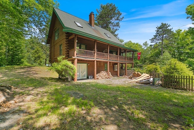 59 Ossipee Mountain Rd, Ossipee, NH 03814 - back of property with a wooden deck, log exterior, and a chimney