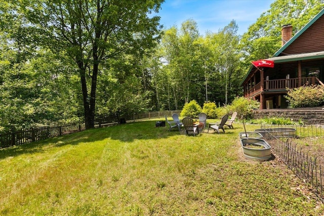 59 Ossipee Mountain Rd, Ossipee, NH 03814 - fenced backyard with a fire pit