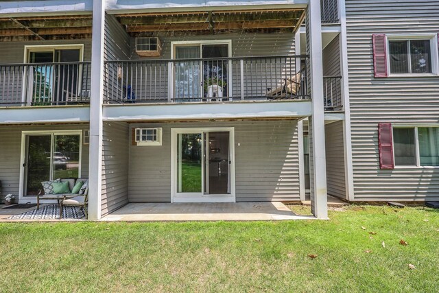 120 Fisherville Rd Unit 8, Concord, NH 03303 - back of house with a balcony, a yard, and a patio