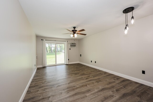 120 Fisherville Rd Unit 8, Concord, NH 03303 - unfurnished room featuring ceiling fan, dark wood-type flooring, and a wall mounted AC