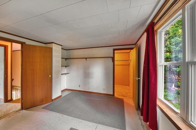 14 W Court Rd, Sunapee, NH 03782 - unfurnished bedroom featuring multiple windows and crown molding
