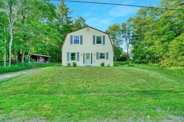 14 W Court Rd, Sunapee, NH 03782 - dutch colonial with a gambrel roof, a front yard, and an outbuilding