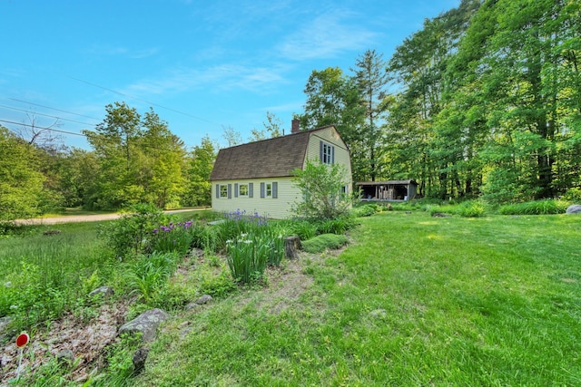 14 W Court Rd, Sunapee, NH 03782 - view of home's exterior featuring a gambrel roof, a lawn, a chimney, and roof with shingles