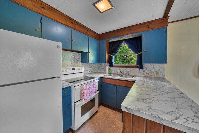 14 W Court Rd, Sunapee, NH 03782 - kitchen featuring white appliances, blue cabinetry, light countertops, and tasteful backsplash