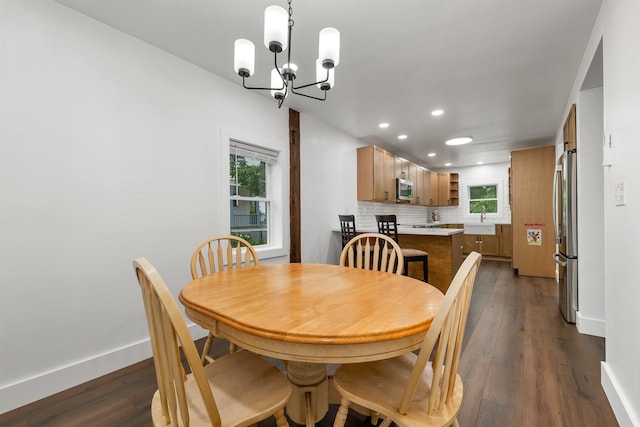 57 Central St, Farmington, NH 03835 - dining room featuring a chandelier, recessed lighting, and dark wood-style flooring