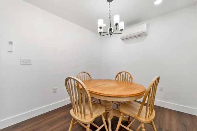 57 Central St, Farmington, NH 03835 - dining area with a wall mounted AC, a chandelier, dark wood-style flooring, and recessed lighting