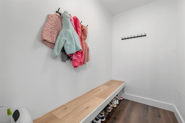 57 Central St, Farmington, NH 03835 - mudroom featuring dark wood-style floors and baseboards