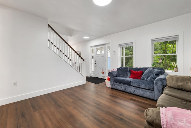 57 Central St, Farmington, NH 03835 - living room featuring stairway, dark wood-type flooring, plenty of natural light, and recessed lighting