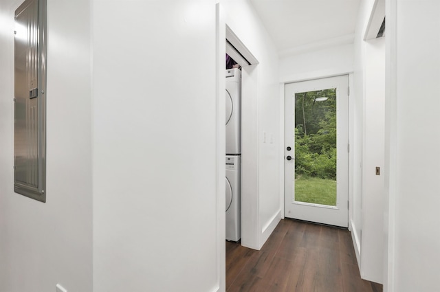 57 Central St, Farmington, NH 03835 - doorway featuring stacked washer / dryer and dark wood-style floors