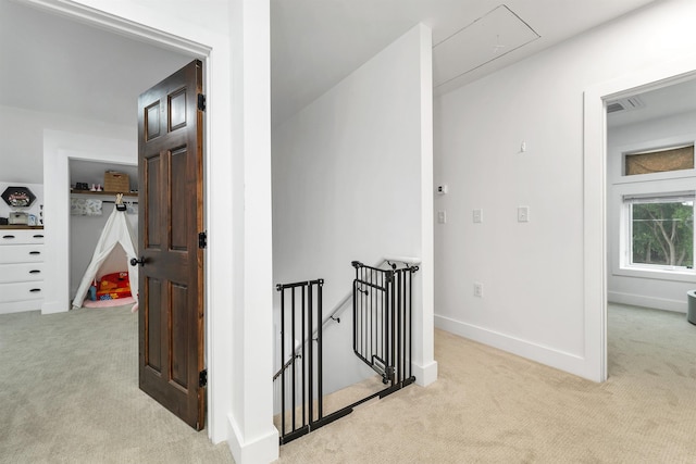 57 Central St, Farmington, NH 03835 - hallway featuring an upstairs landing, carpet, and attic access