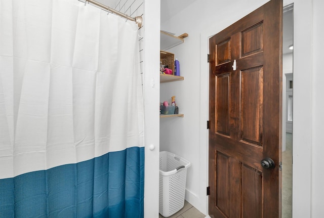57 Central St, Farmington, NH 03835 - bathroom with tile patterned floors and curtained shower