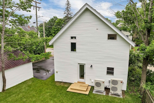 57 Central St, Farmington, NH 03835 - back of property with a yard