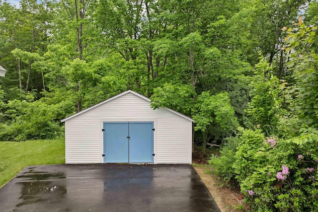 57 Central St, Farmington, NH 03835 - view of outdoor structure with a view of trees