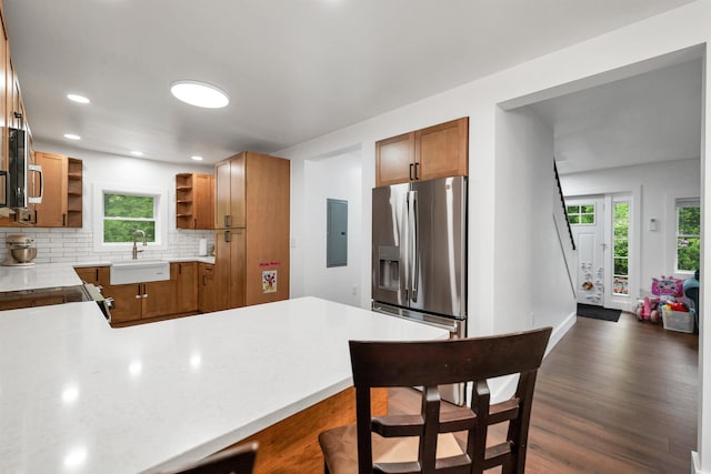 57 Central St, Farmington, NH 03835 - kitchen with open shelves, appliances with stainless steel finishes, dark wood-type flooring, healthy amount of natural light, and recessed lighting