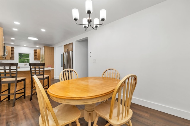57 Central St, Farmington, NH 03835 - dining area featuring dark wood finished floors, a chandelier, and recessed lighting