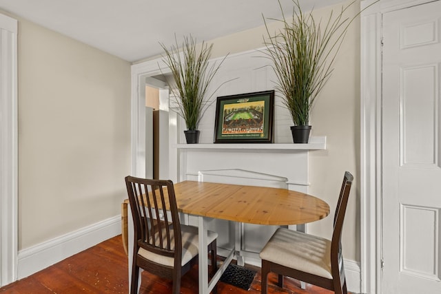 163B Locust St, Dover, NH 03820 - dining area featuring baseboards and wood finished floors