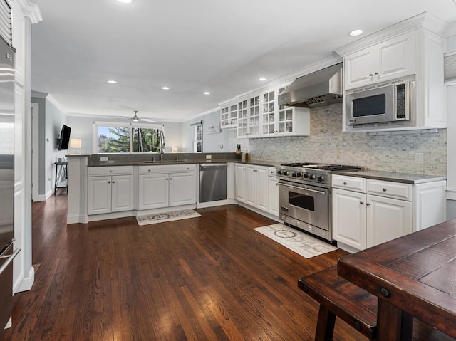 7 Reservoir Rd, Otis, MA 01253 - kitchen with appliances with stainless steel finishes, range hood, a peninsula, recessed lighting, and glass insert cabinets