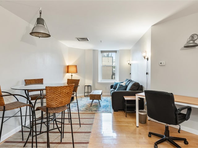 131 Main St Unit 308, Burlington, VT 05401 - dining space with light wood-type flooring and an office area
