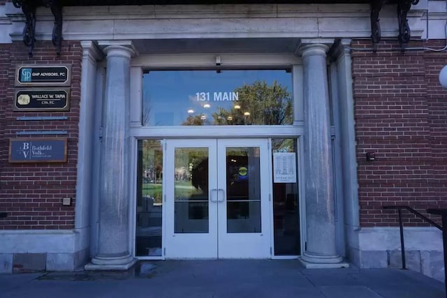 131 Main St Unit 308, Burlington, VT 05401 - property entrance with french doors and brick siding