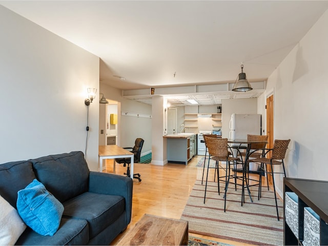 131 Main St Unit 308, Burlington, VT 05401 - living room with light wood-style flooring and baseboards